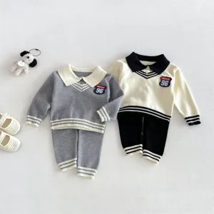 Detailed view of stylish toddler knit sweater and pants sets in grey and beige color options.