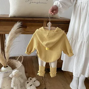 Girls spring knit hooded sweater and leggings set detail view, cute yellow toddler outfit.
