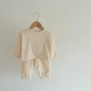 Infant baby waffle knit long sleeve sweatshirt and pants set with cute embossed bear design.