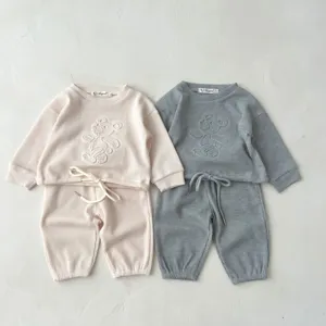Toddler waffle knit sweatshirt and pants two-piece set, cozy long sleeve casual wear.