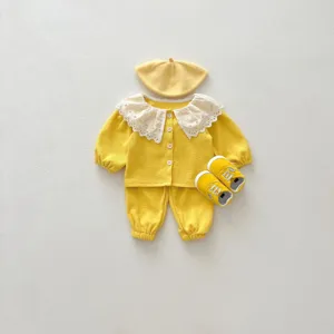 Infant yellow waffle knit outfit set featuring white lace collar for autumn season.