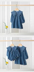 Baby girl denim dress and romper set with ruffled collar and cute bow print. Sweet style.