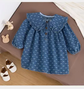 Cute baby girl denim dress with ruffle collar, bow prints, long sleeves and button front.