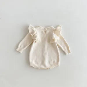 Baby knitted romper with flying sleeves, cute off-white infant long sleeve bodysuit details.