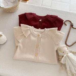 Cute baby knit cardigan sweater with flying sleeves, cozy autumn newborn clothes detail.