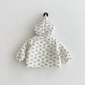 Infant baby hooded cotton jacket with cute bow print and pom-pom detail, cozy winter outerwear.