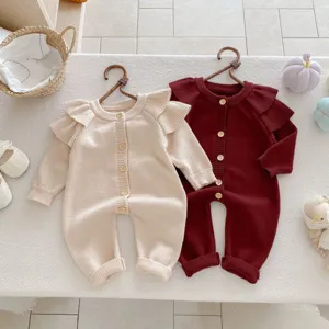 Baby knitted romper set with cute fly sleeves and front buttons, cozy autumn newborn clothes.