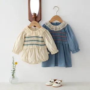 Cute infant baby girl long sleeve smocked romper and dress set with sweet lace collar.