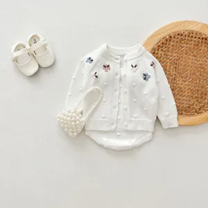 Infant baby girl white knit cardigan and romper set with handmade floral embroidery.