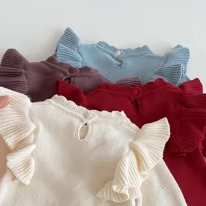 Infant knitted ruffled sweater detail view, cute toddler warm winter knitted top.