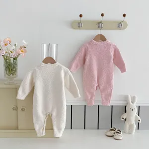 Cozy thick baby romper detail view, soft fleece material, cute long sleeve winter sleepwear.