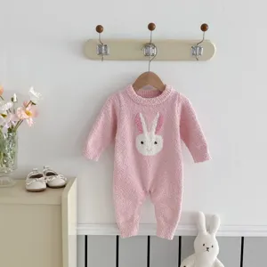 Cute pink fluffy baby winter romper detail, soft plush long sleeve infant bunny jumpsuit.