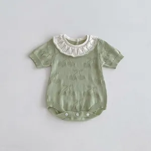 Cute baby knit romper with ruffled collar and sweet cherry pattern, ideal cute summer wear.