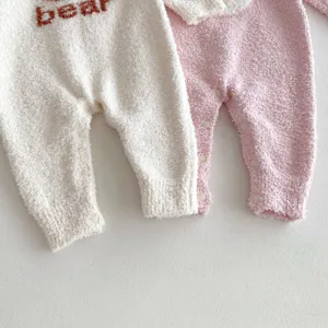 Cozy fleece baby romper closeup, thick warm winter jumpsuit, soft snap buttons design.