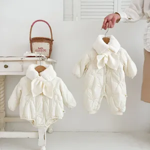 Infant winter padded onesie detail, cute plush collar bow tie, floral quilted fabric.