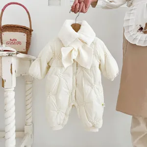 Infant baby cream white winter padded onesie detail, featuring plush collar and bowknot.