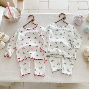 Kids cute floral pajama set, long sleeve top and pants, comfortable cotton home wear for autumn.