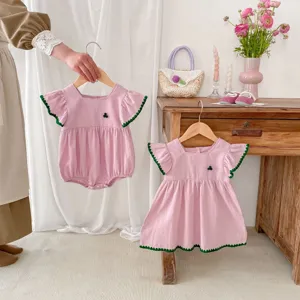 Baby summer pink romper and dress set, cute green trim and floral embroidery for newborn baby girls.