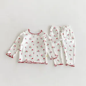 Kids long sleeve floral pajamas set, cute red lettuce edge cotton sleepwear for girls detail.
