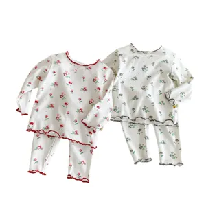 Cute children floral long sleeve pajama sets, comfortable cotton home wear for girls.