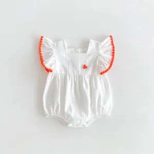 White baby romper detail, cute square neck with orange pom-pom flutter sleeves, summer wear.