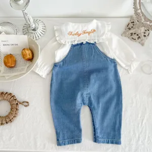 Cute baby girl autumn long sleeve blouse and denim overalls set for lovely toddler daily wear.