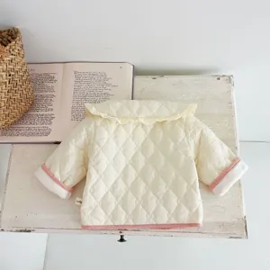 Details of baby quilted jacket with chic pink knit trim and cute ruffled collar in cream.
