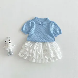 Infant sweet summer outfit set, blue knit top and white lace tiered skirt for baby girls.