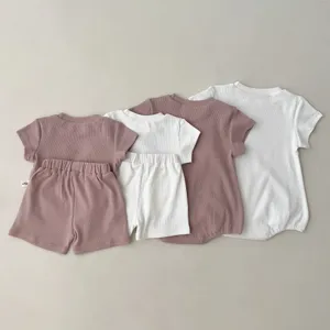Baby summer clothing sets include solid color cotton t-shirts, shorts and cute rompers.