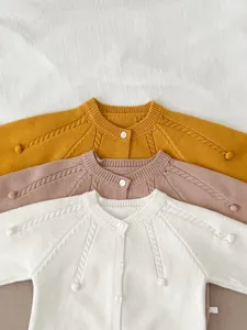 Infant baby knitted cardigan sweater, solid color cable knit design with cute buttons.