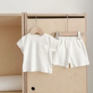 Minimalist white ribbed short sleeve t-shirt and shorts set for kids summer daily wear.