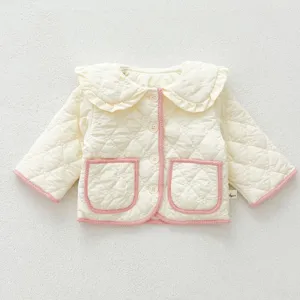 Quilted baby jacket detail, cute ruffles collar and pink trim, cozy winter toddler outwear.
