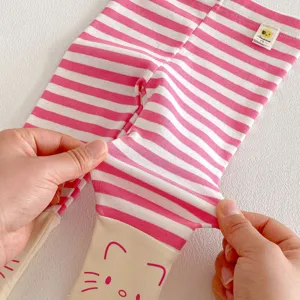 Pink striped baby leggings detail view showing soft stretch knit fabric with cute cat cuffs.
