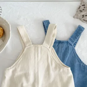 Cute toddler cotton denim overalls for baby girls, comfortable loose fit trousers for autumn.