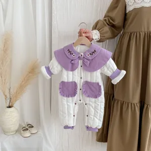 Cozy winter baby girl padded romper with purple floral collar and warm quilted cotton material.
