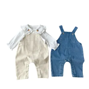 Cute baby girl autumn outfit set with ruffled blouse and cotton dungarees overalls