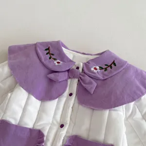 Infant winter quilted romper close-up, purple collar with floral embroidery and bow.
