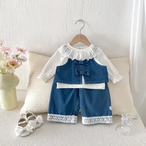 Details of stylish girls three-piece set, featuring lace collar top, denim vest and pants.