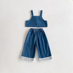Kids denim two-piece outfit set, stylish sleeveless crop top and cute lace trim wide-leg pants.
