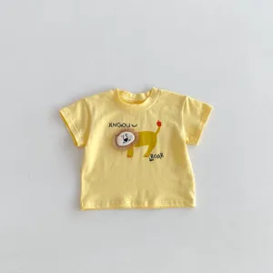 Detailed view of baby yellow short sleeve t-shirt featuring cute lion patch and letter print.
