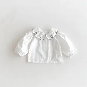 Infant baby white cotton long sleeve blouse with cute doll collar and grey embroidery detail.