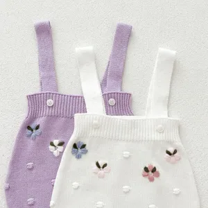 Baby knitted strap romper detail, cute floral embroidery and buttons, soft cotton material.