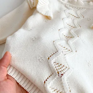 Baby white knit sweater detail, cute ruffle collar and delicate hollow-out pattern.