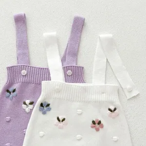 Infant baby knit romper detail, cute floral embroidery design, soft cotton suspender set.