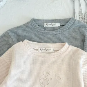 Cute infant waffle knit sweatshirt for baby girls and boys, cozy autumn casual toddler top.
