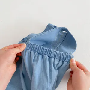 Baby summer light blue denim crawler detail show, soft fabric with elastic waist and cute straps.