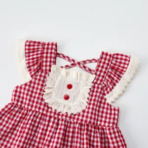 Sweet toddler girls red and white gingham doll shirt with cute ruffles and lace trim.