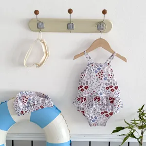 Cute floral toddler baby one-piece swimsuit set with matching swim cap for summer beach.