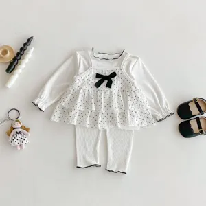 Sweet polka dot baby girl three-piece set featuring a camisole, base shirt, and leggings.