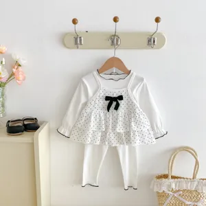 Sweet baby girls 3-piece set with polka dot camisole, ruffled t-shirt and leggings for autumn.